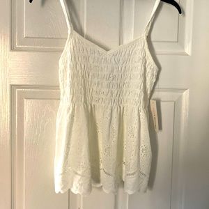White eyelet ruffled tank top